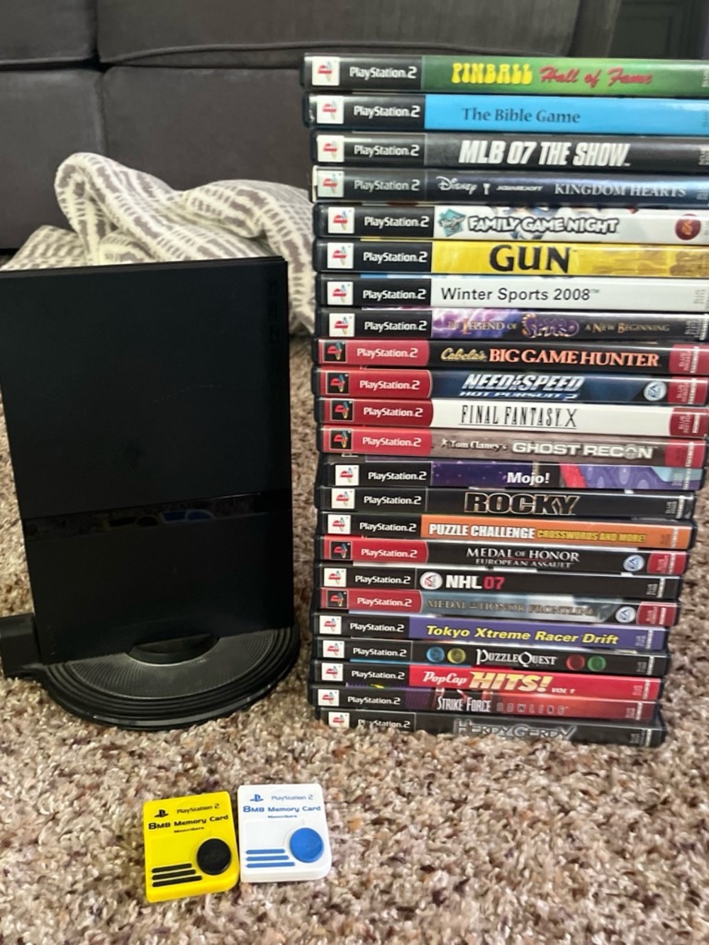 Sony PlayStation 2 Slim Console with Black Finish and Memory Cards
